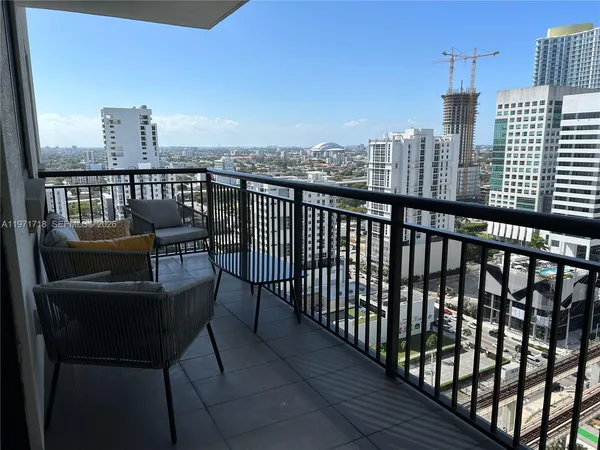 a view of a balcony with city view