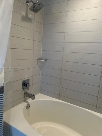 a bathroom with a bathtub