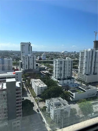 a view of a city with tall buildings