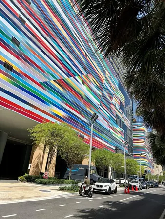 a view of street with cars parked