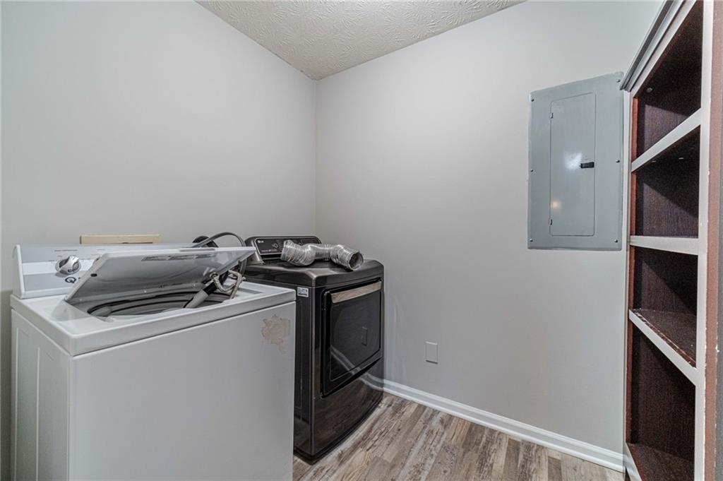 1220 Fieldgate Road Lawrenceville, GA 30044 - Photo 20 of 45 a utility room with dryer and washer