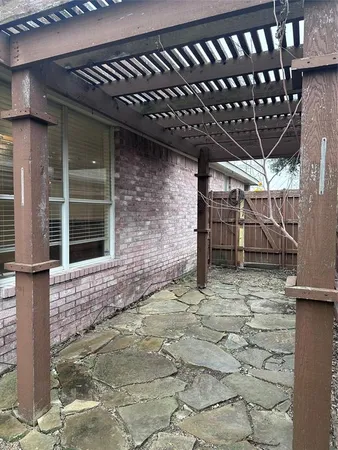 a view of a porch of a house