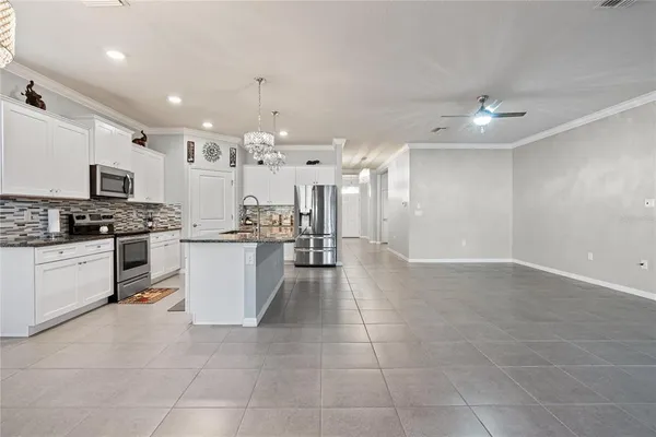 a large kitchen with cabinets