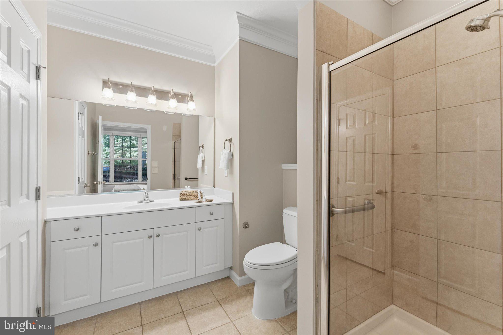 503 Sunset View Terrace Southeast, Unit 101 Leesburg, VA 20175 - Photo 19 of 39 Bright and airy modern bathroom retreat.