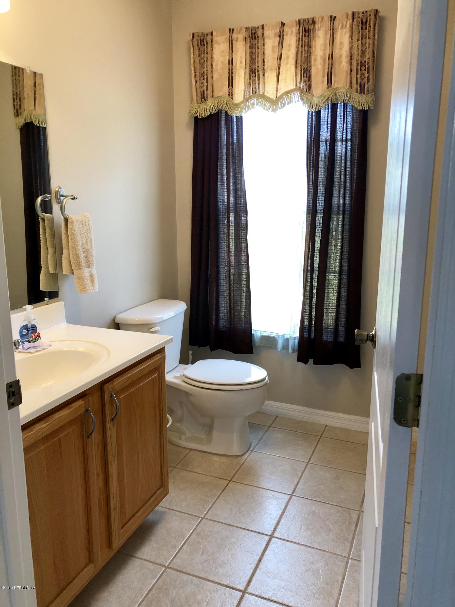 4590 Raintree Drive Macclenny, FL 32063 - Photo 21 of 37 DOWNSTAIRS BATH