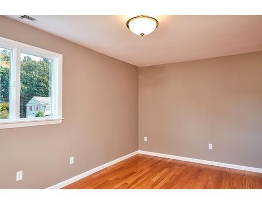 17 Rustic Lane Reading, MA 01867 - Photo 25 of 40 a view of an empty room with a window