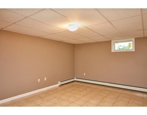 17 Rustic Lane Reading, MA 01867 - Photo 35 of 40 a view of an empty room with a window