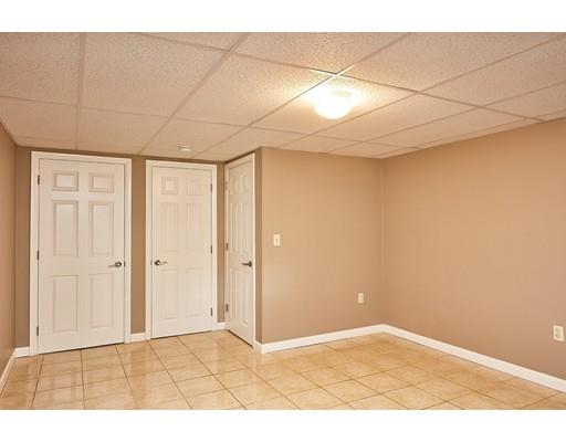 17 Rustic Lane Reading, MA 01867 - Photo 38 of 40 a view of an empty room with a window