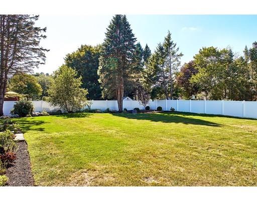 17 Rustic Lane Reading, MA 01867 - Photo 40 of 40 a swimming pool with wooden fence