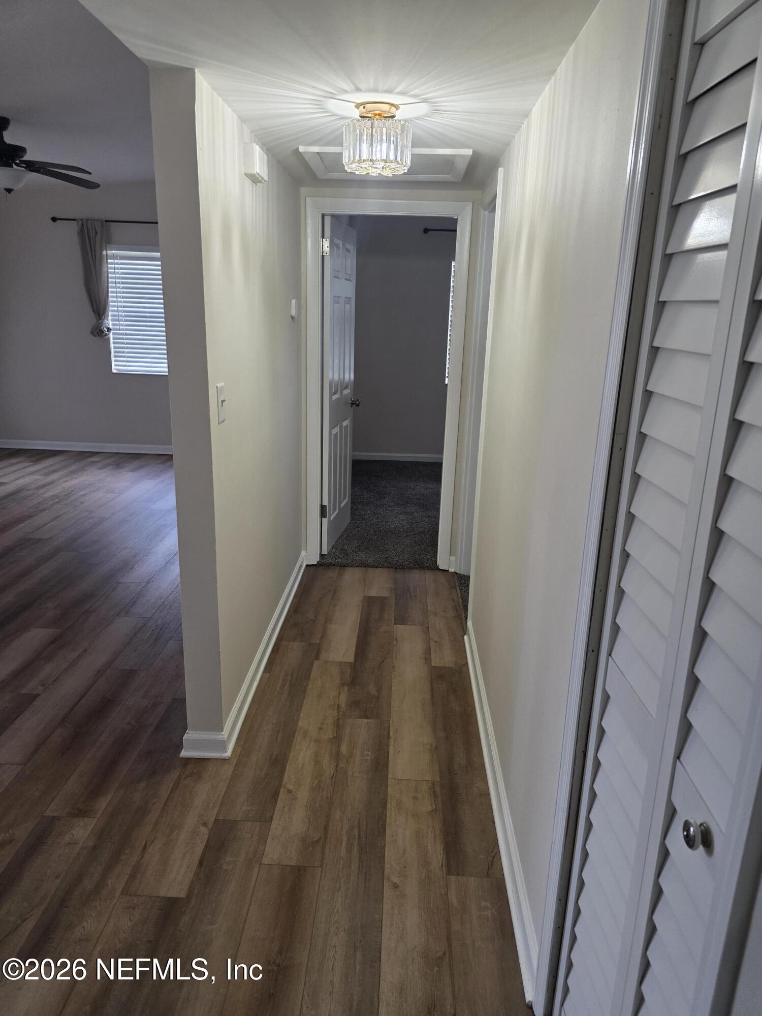 3616 Toledo Road Jacksonville, FL 32217 - Photo 23 of 34 a view of a hallway view with wooden floor and staircase