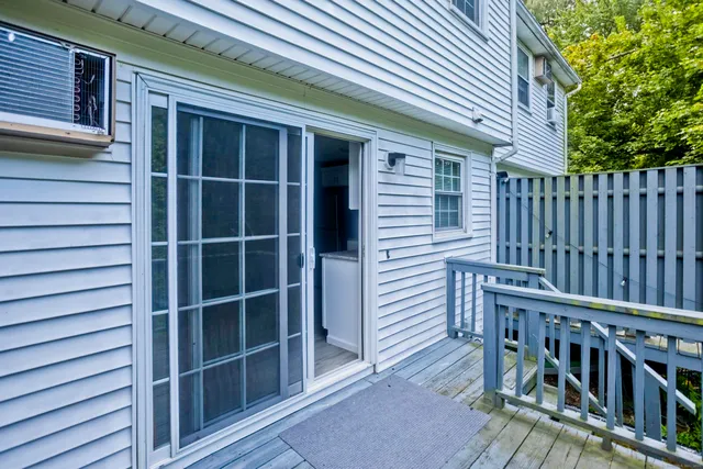 a view of a house with a large window