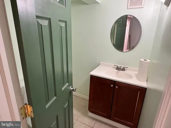 a room with gym equipment and a large window