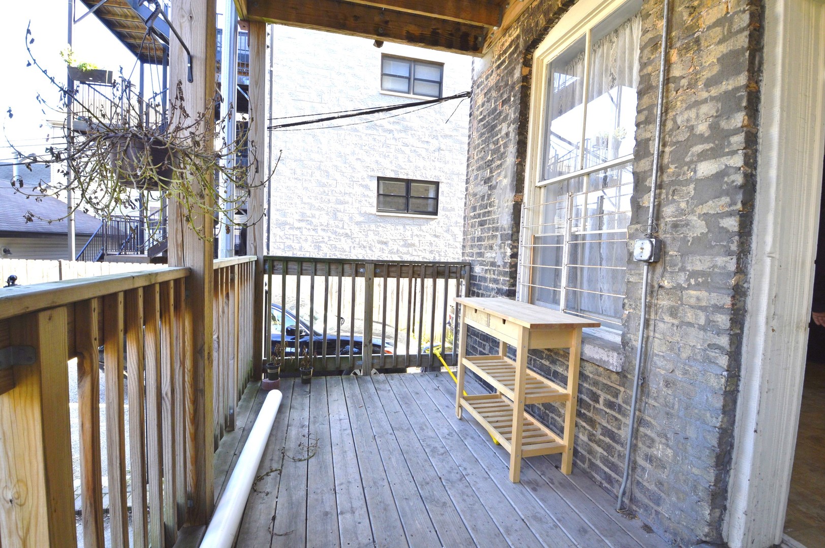 1924 West Crystal Street, Unit 3 Chicago, IL 60622 - Photo 11 of 13 a view of a balcony with wooden floor