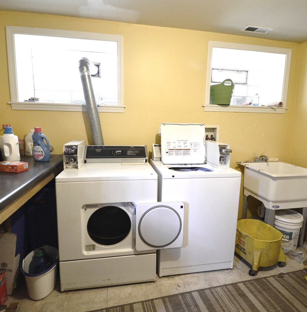 1924 West Crystal Street, Unit 3 Chicago, IL 60622 - Photo 12 of 13 a utility room with dryer and washer
