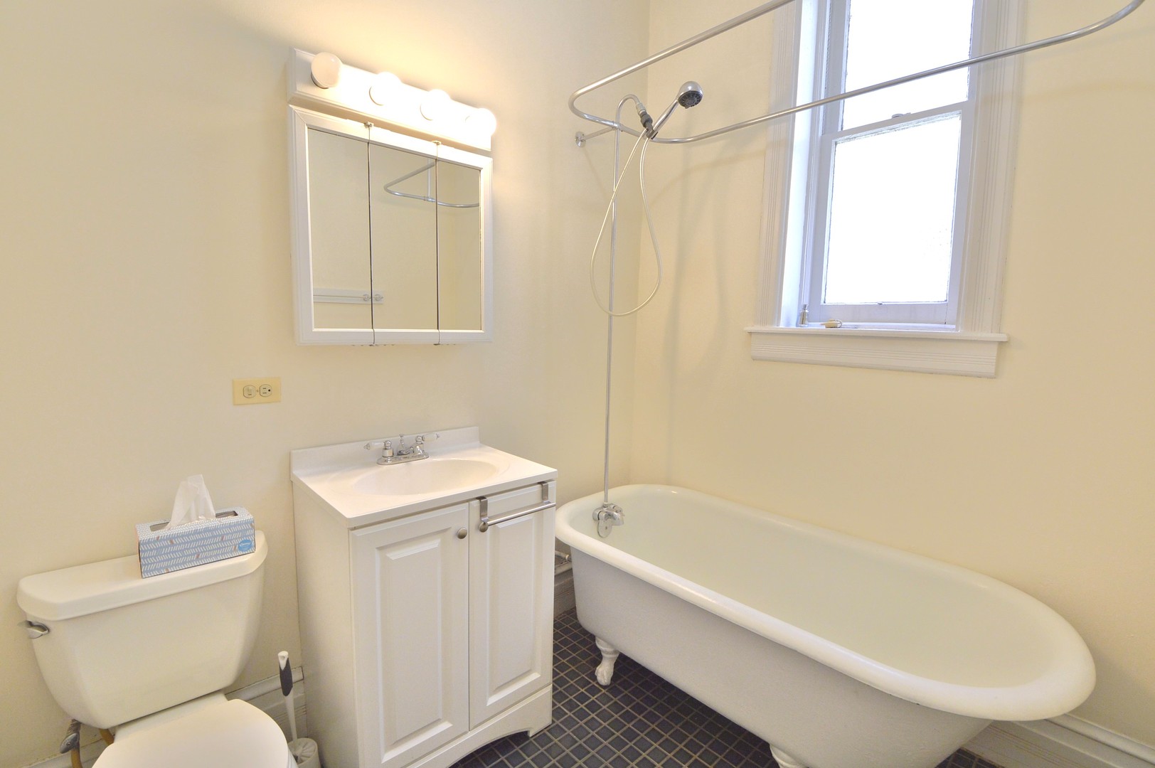 1924 West Crystal Street, Unit 3 Chicago, IL 60622 - Photo 7 of 13 a bathroom with a sink a toilet and shower