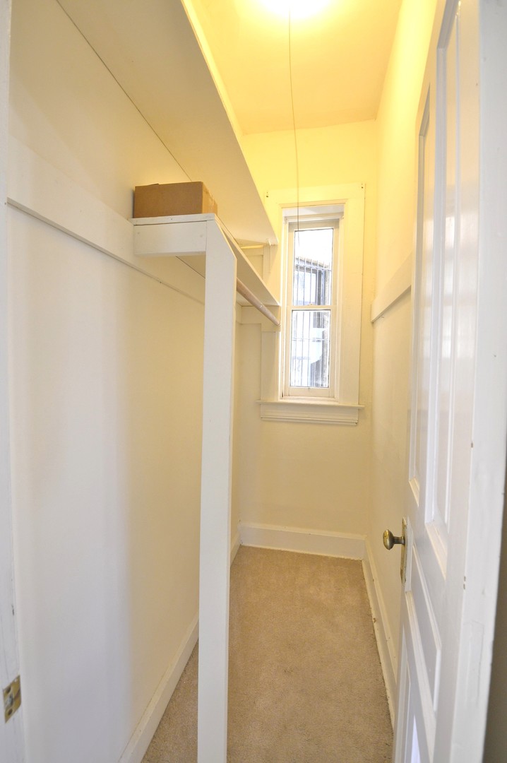 1924 West Crystal Street, Unit 3 Chicago, IL 60622 - Photo 8 of 13 a view of a small space with wooden floor and a window