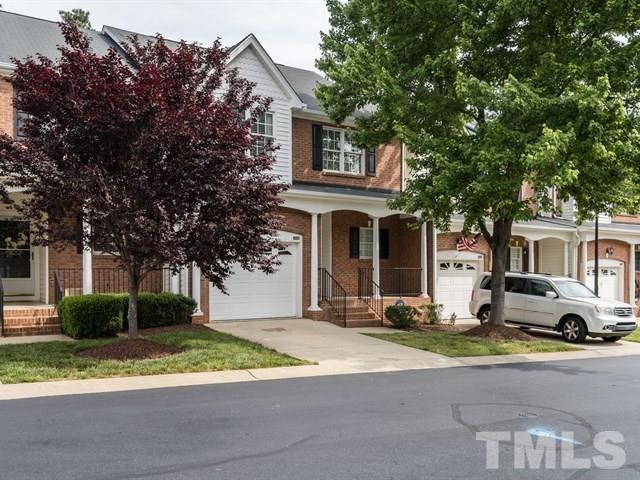 4528 Mistiflower Drive Raleigh, NC 27606 - Photo 25 of 25 a front view of a house with a yard