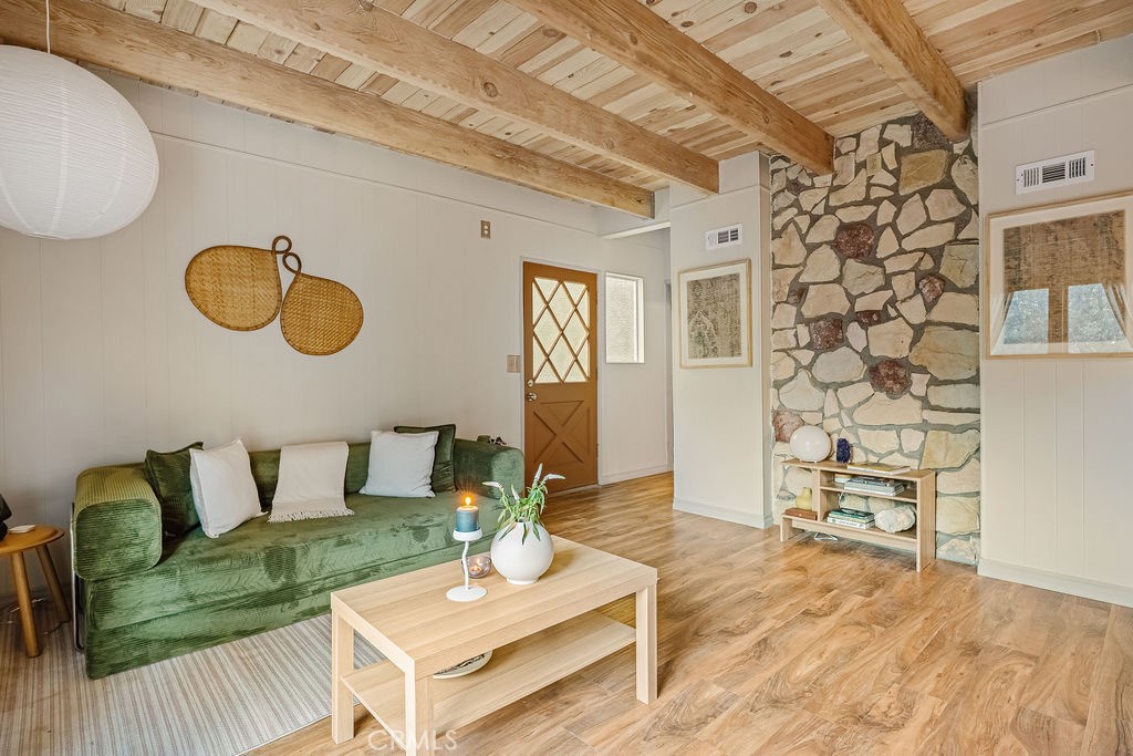 989 Calanda Drive Crestline, CA 92325 - Photo 9 of 30 a living room with furniture and a wooden floor