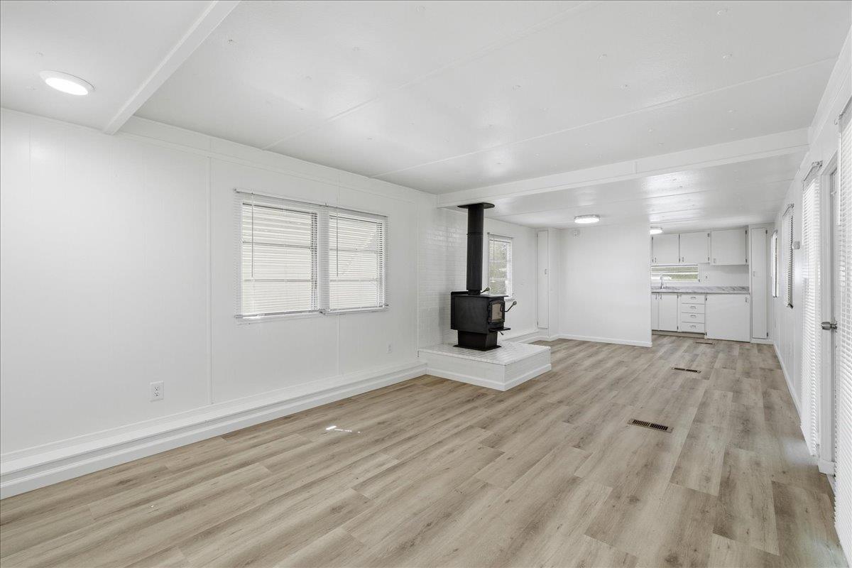 1525 Cold Springs Road, Unit 48 Placerville, CA 95667 - Photo 5 of 23 a view of empty room with wooden floor