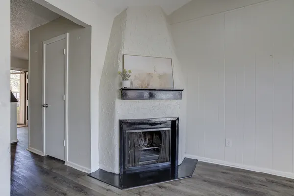 a living room with a fireplace