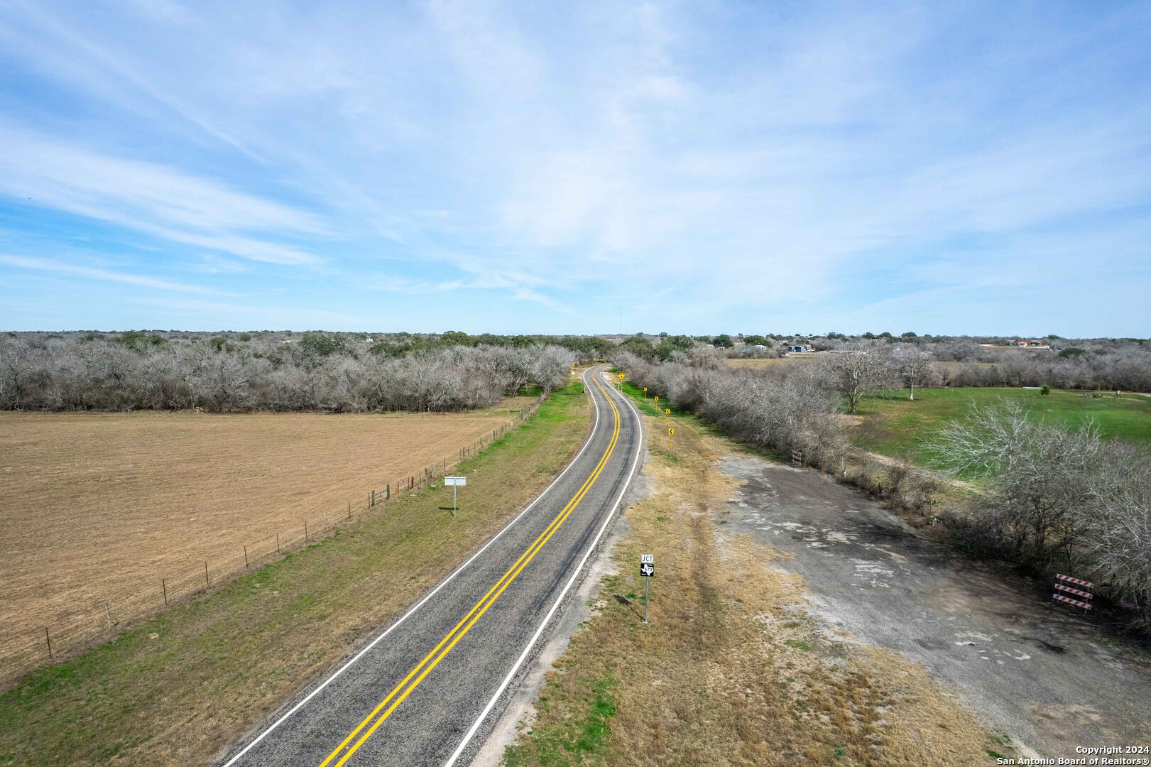 8684 Mineral Cemetery Road Beeville, TX 78102 - Photo 28 of 38 a view of a lake with a city