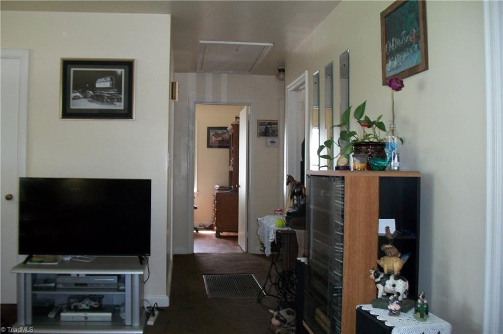 629 East State Avenue High Point, NC 27262 - Photo 20 of 26 Living Room w/Coat closet going toward Bedrooms