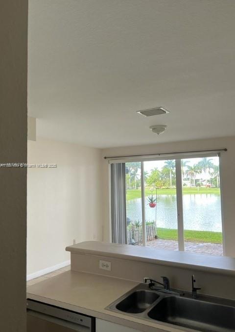 205 Southeast 29th Terrace, Unit 5 Homestead, FL 33033 - Photo 11 of 17 a bathroom with a sink and a bathtub