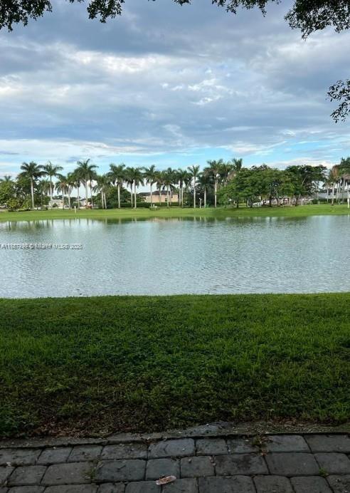 205 Southeast 29th Terrace, Unit 5 Homestead, FL 33033 - Photo 16 of 17 a view of a lake with a city view