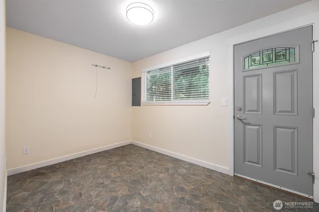 an empty room with windows