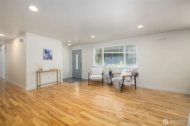 a living room with furniture and a table