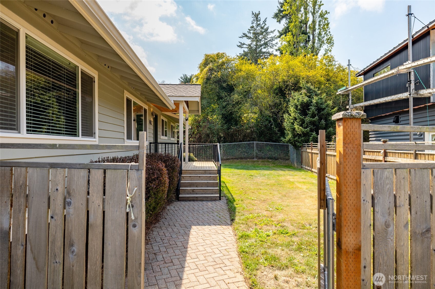 611 Whatcom Street La Conner, WA 98257 - Photo 23 of 26 a view of a house with a swimming pool