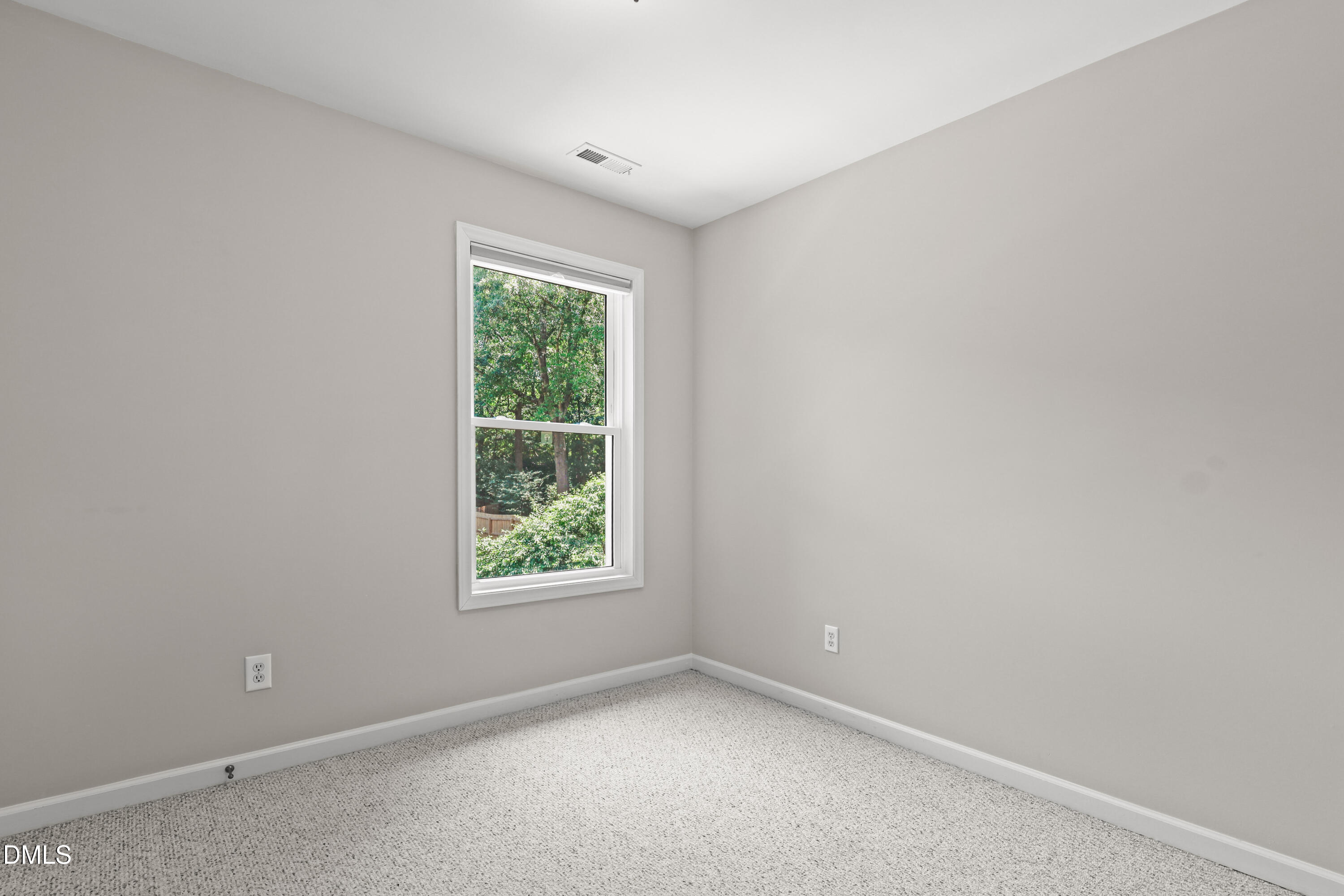 3015 Rennit Court Raleigh, NC 27603 - Photo 25 of 40 an empty room with a window