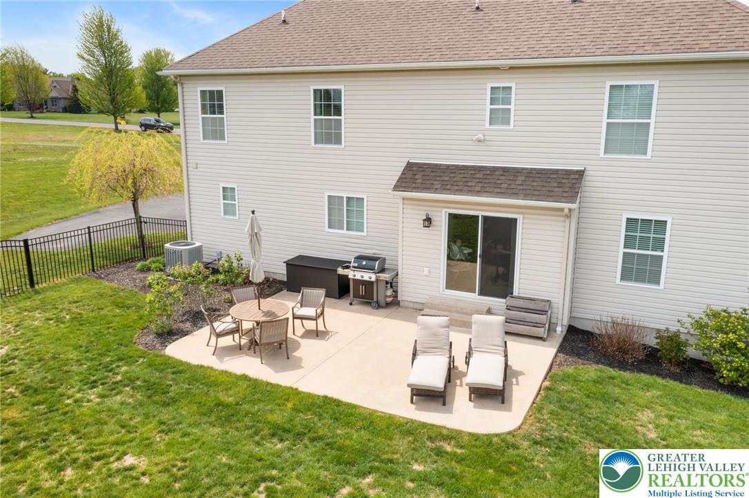 208 East Dell Road Bath, PA 18014 - Photo 31 of 40 a view of a house with backyard sitting area and garden