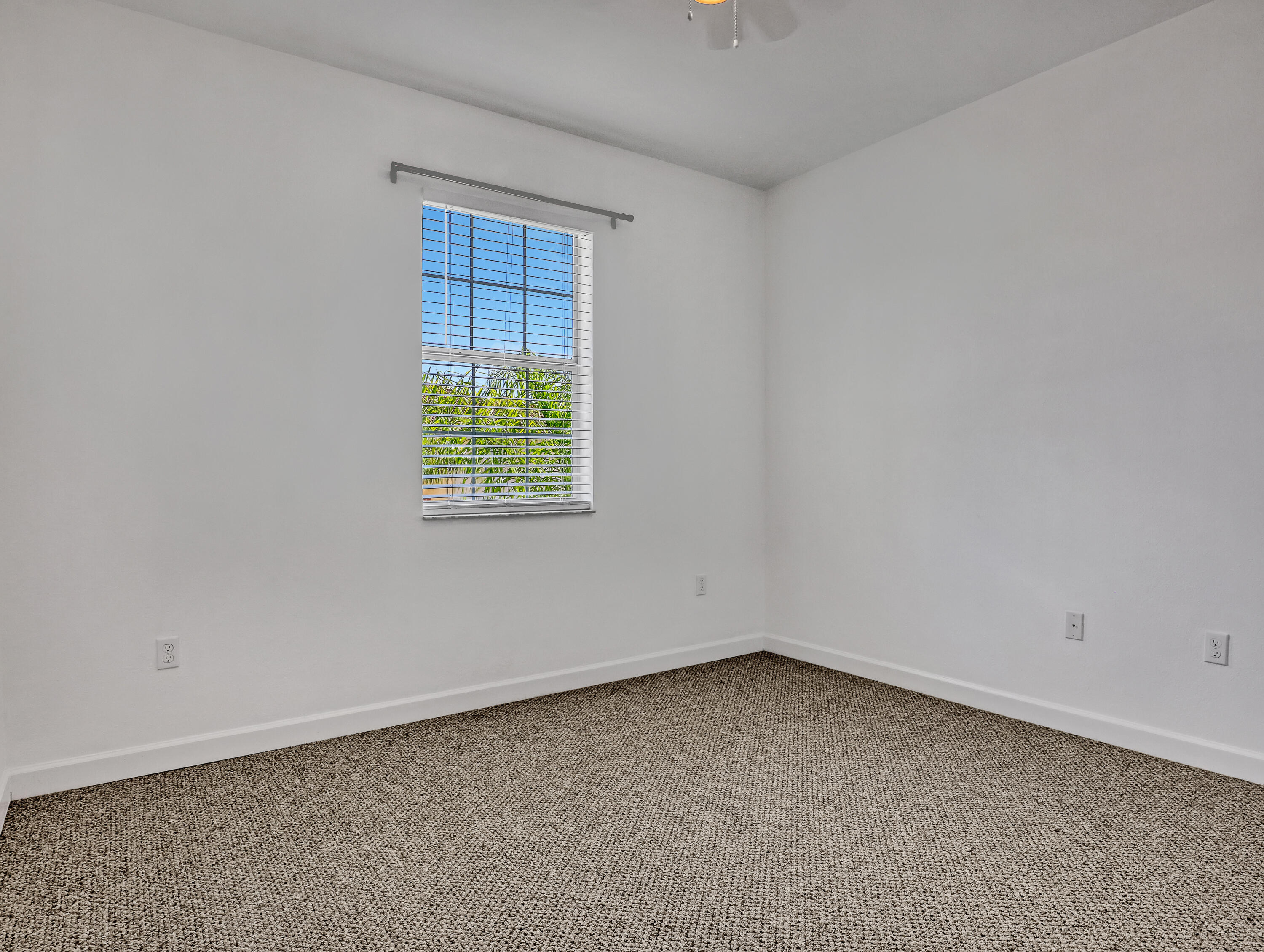 9508 Southwest Otter Lane Stuart, FL 34997 - Photo 28 of 34 an empty room with a window