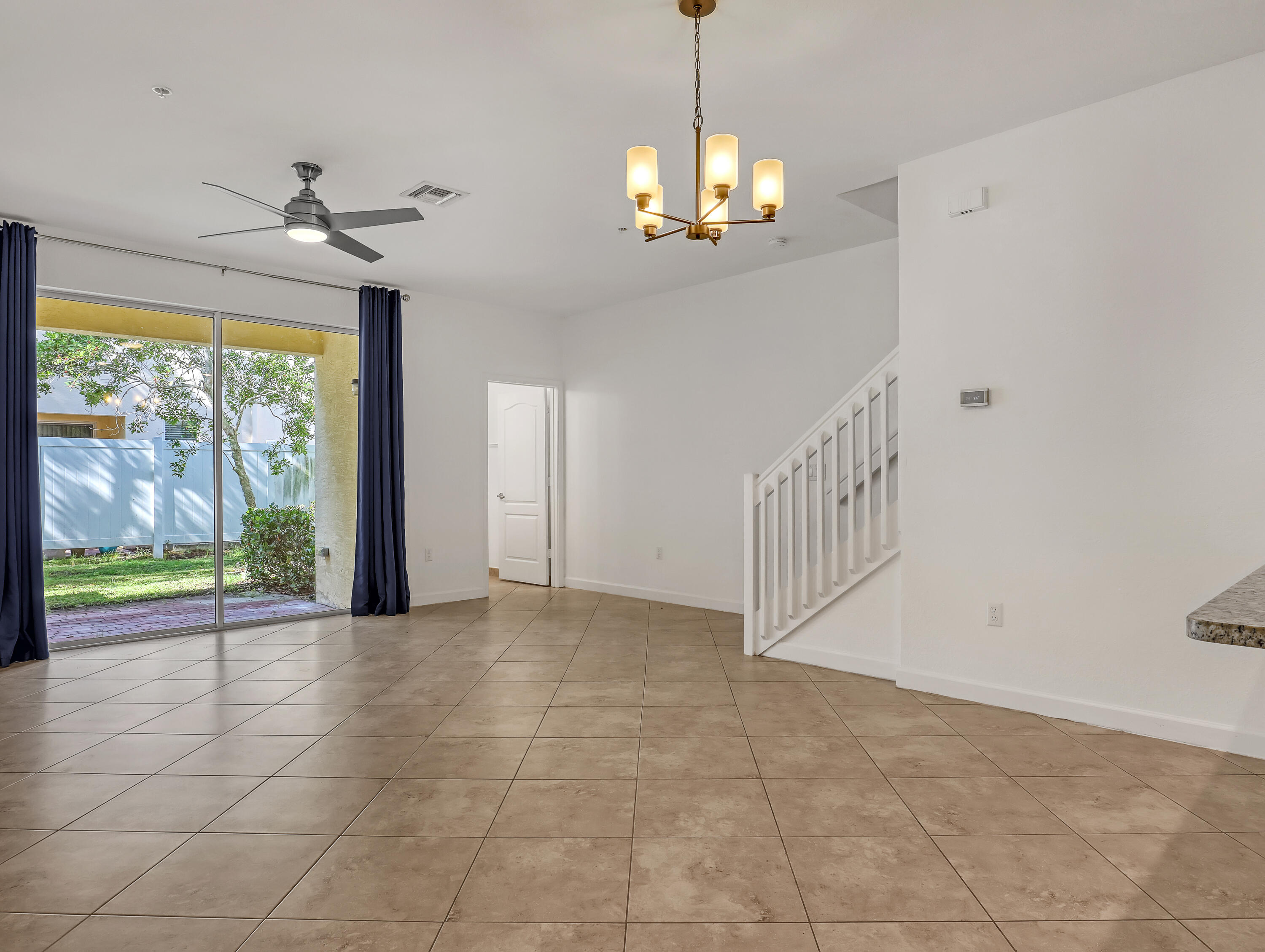 9508 Southwest Otter Lane Stuart, FL 34997 - Photo 7 of 34 a view of an empty room with a window