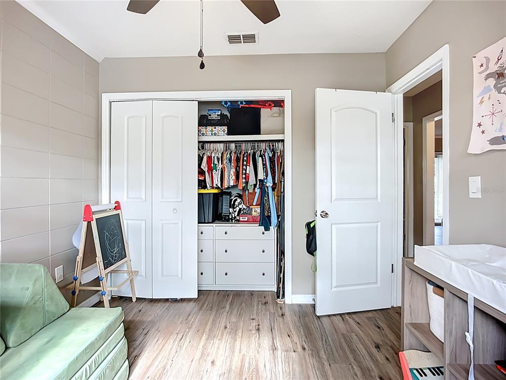 1304 Alfred Street, Unit B Brandon, FL 33510 - Photo 15 of 26 a living room with furniture and wooden floor