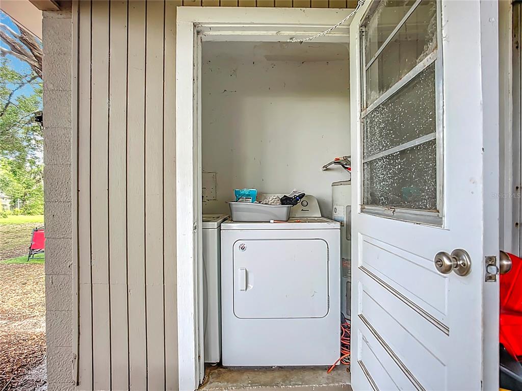 1304 Alfred Street, Unit B Brandon, FL 33510 - Photo 20 of 26 a utility room with dryer and washer