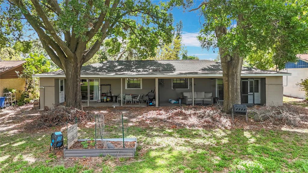 1304 Alfred Street, Unit B Brandon, FL 33510 - Photo 23 of 26 a front view of a house with garden