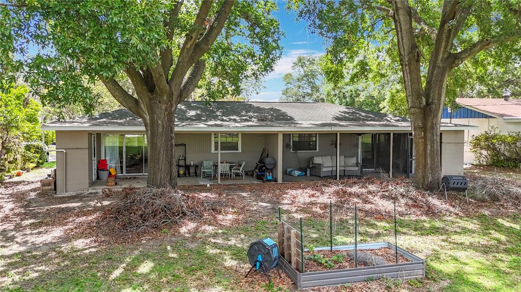 1304 Alfred Street, Unit B Brandon, FL 33510 - Photo 25 of 26 a front view of a house with garden