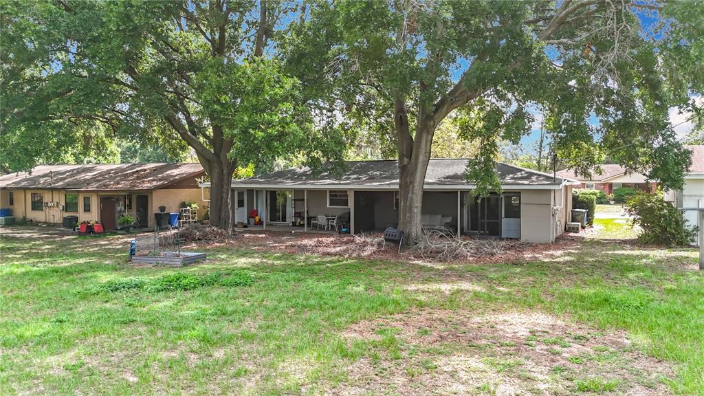 1304 Alfred Street, Unit B Brandon, FL 33510 - Photo 26 of 26 a view of a house with a yard and sitting area