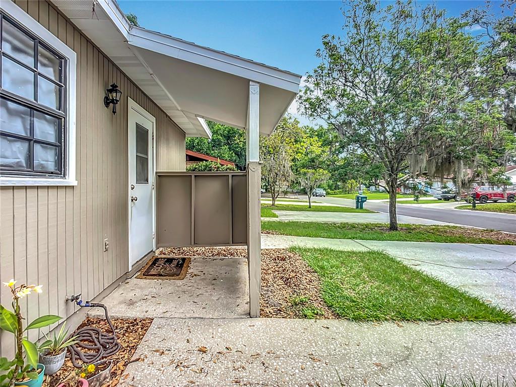 1304 Alfred Street, Unit B Brandon, FL 33510 - Photo 4 of 26 a view of a house with a yard