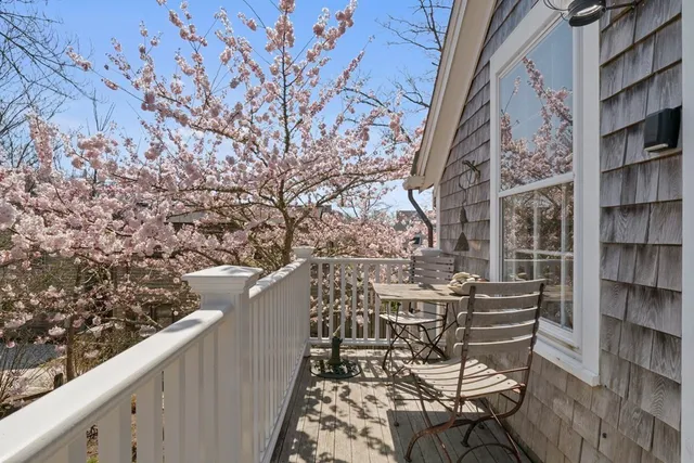 a view of balcony with chairs
