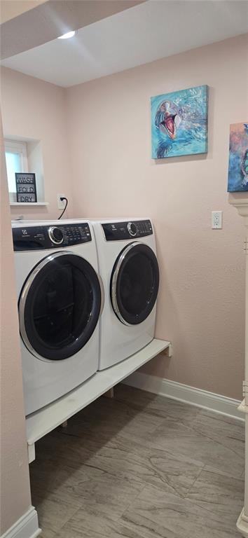 538 Crystal Drive Madeira Beach, FL 33708 - Photo 12 of 21 a utility room with dryer and washer