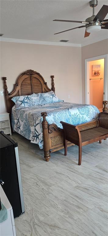 538 Crystal Drive Madeira Beach, FL 33708 - Photo 15 of 21 a bedroom with a bed and a dresser