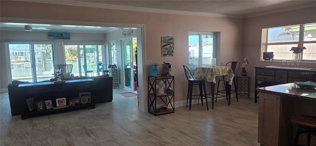 538 Crystal Drive Madeira Beach, FL 33708 - Photo 6 of 21 a living room with furniture window and wooden floor