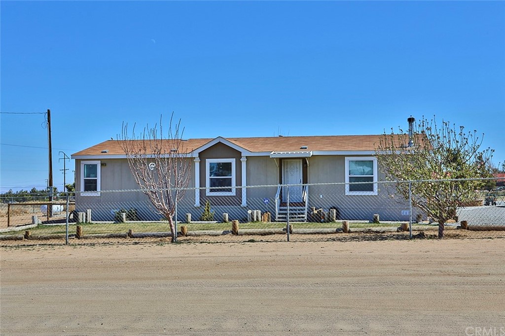9607 Middleton Road Phelan, CA 92371 - Photo 1 of 1 a front view of a house with a yard