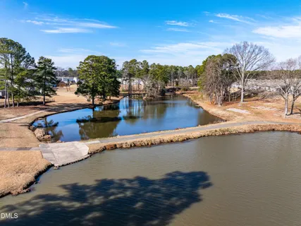 a view of a swimming pool with an ocean view