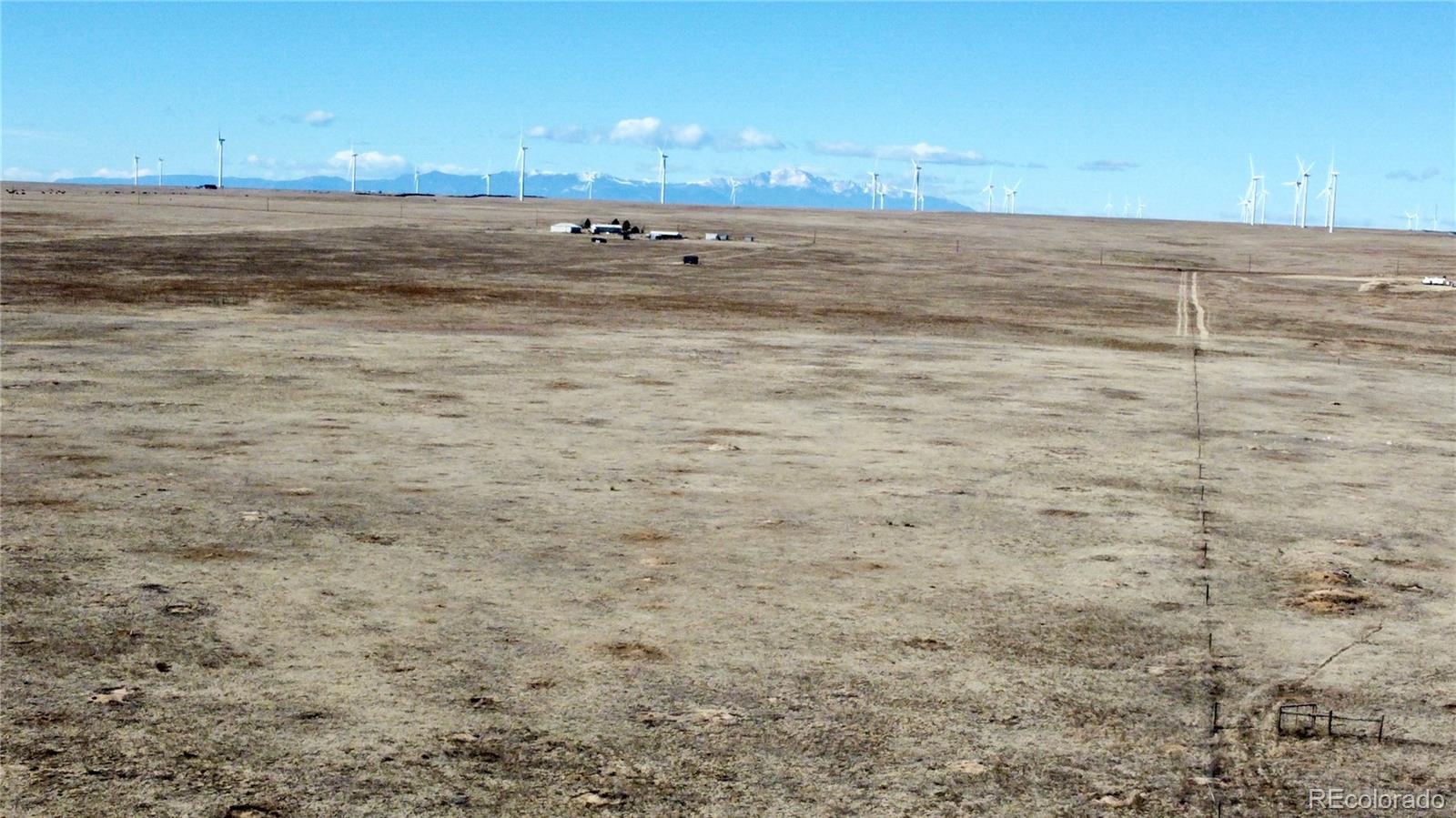 9320 Mulberry Road Calhan, CO 80808 - Photo 17 of 19 a view of beach and ocean
