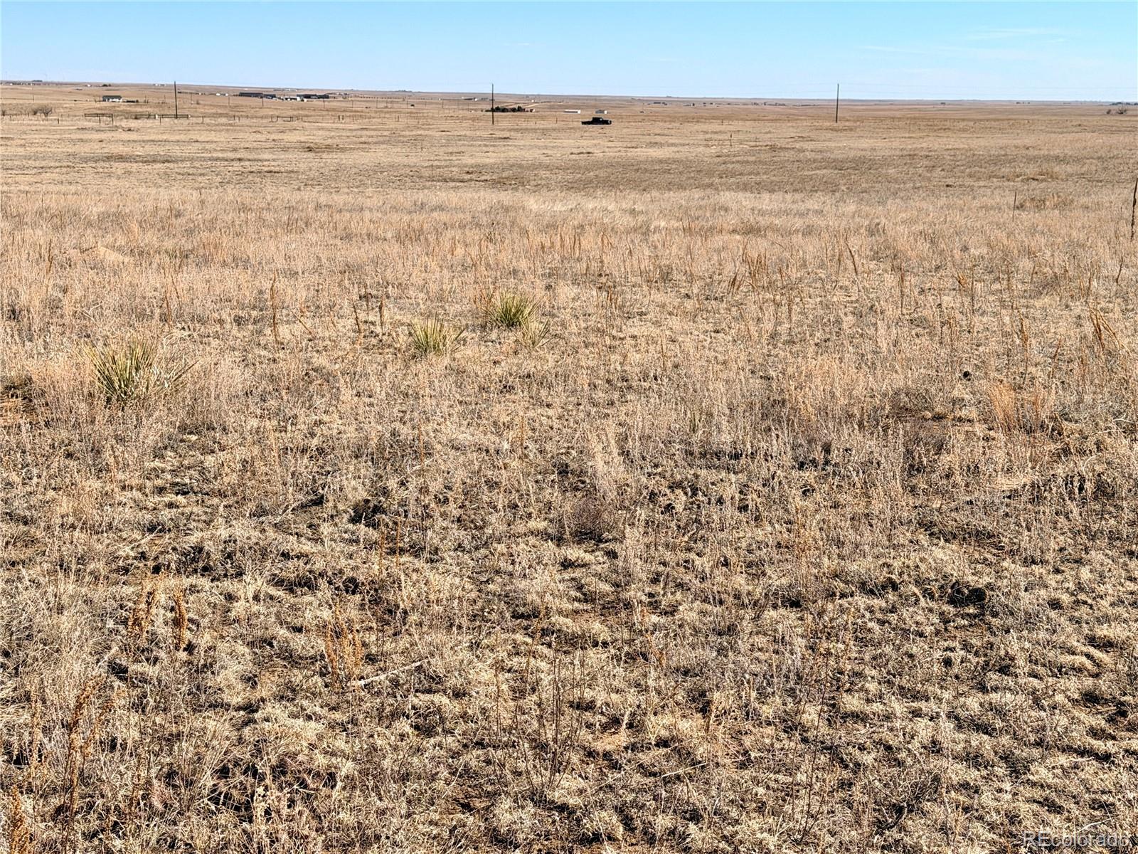 9320 Mulberry Road Calhan, CO 80808 - Photo 3 of 19 a view of beach and ocean