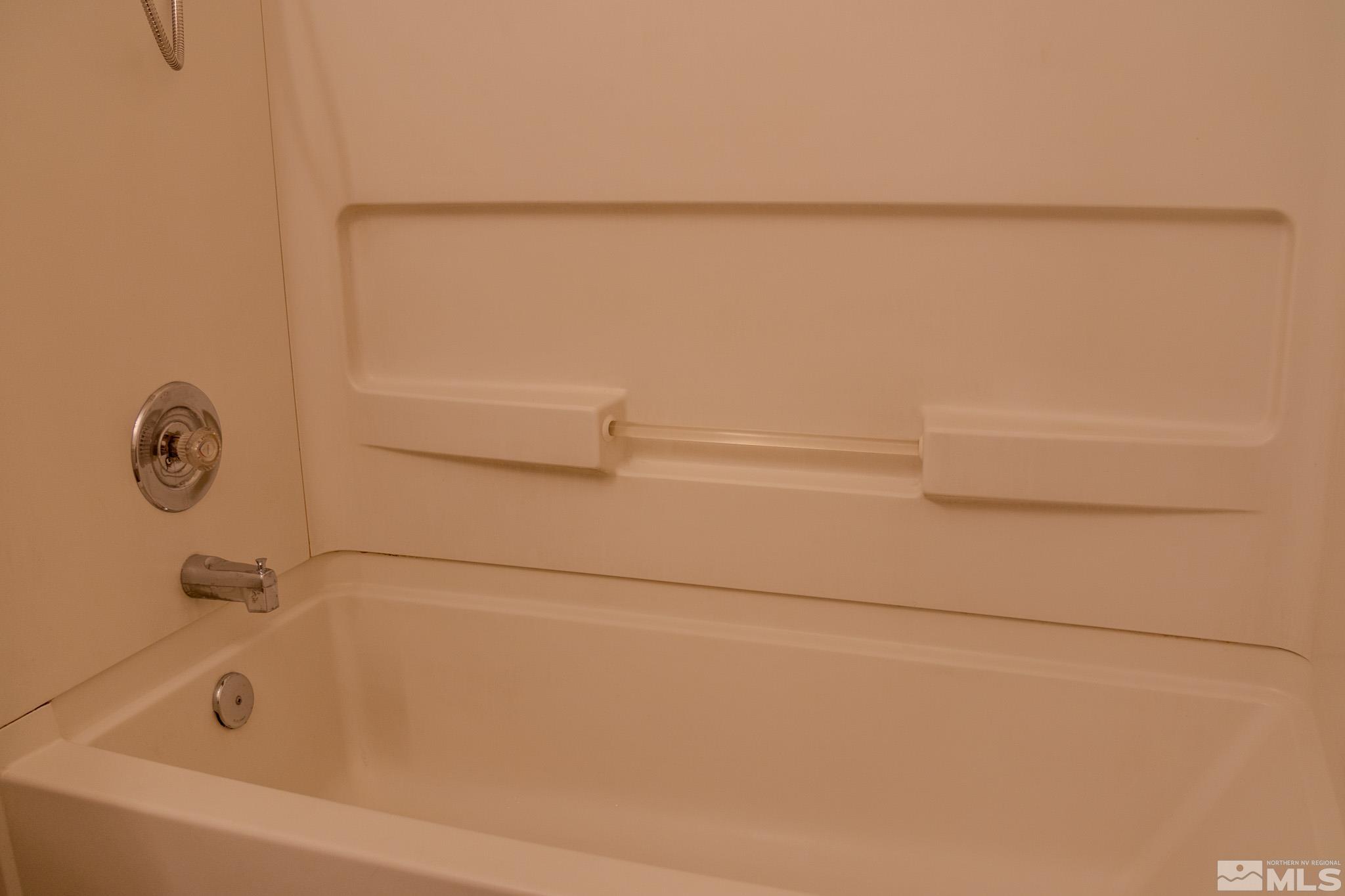 175 East Grove Street, Unit 30 Reno, NV 89502 - Photo 11 of 11 a bathroom with a bath tub